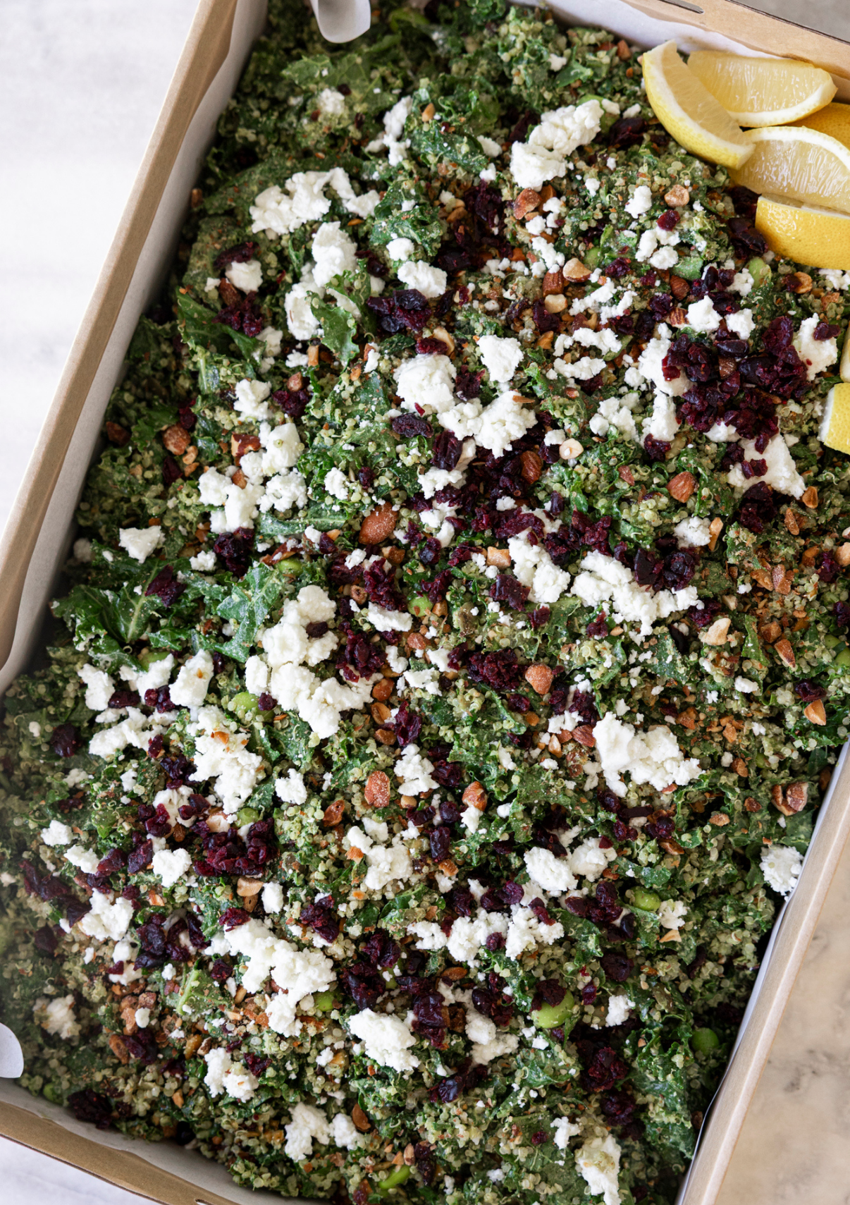 Green salad, kale, edamame, quinoa, cranberries, almonds, goat's feta, green goddess dressing