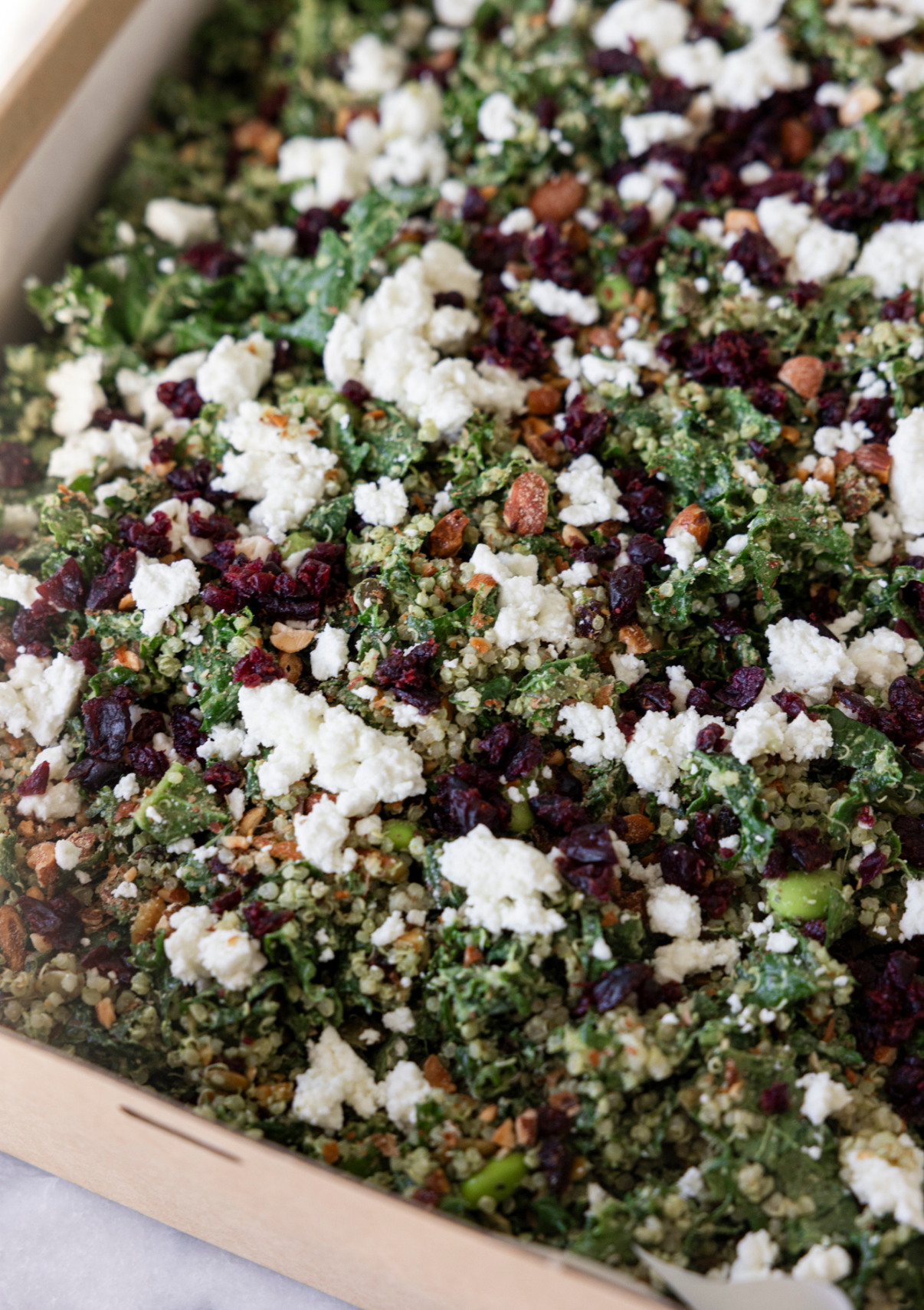 Green salad, kale, edamame, quinoa, cranberries, almonds, goat's feta, green goddess dressing